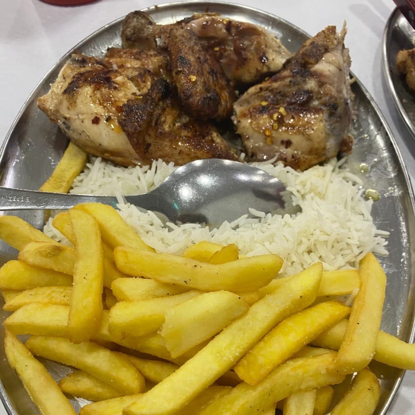Peri Peri grilled chicken with rice and french fries
