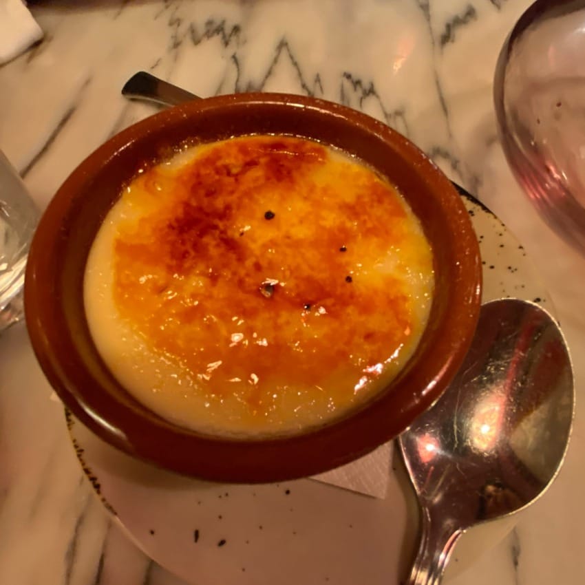 The grilled sugary lid of a creme brûlée