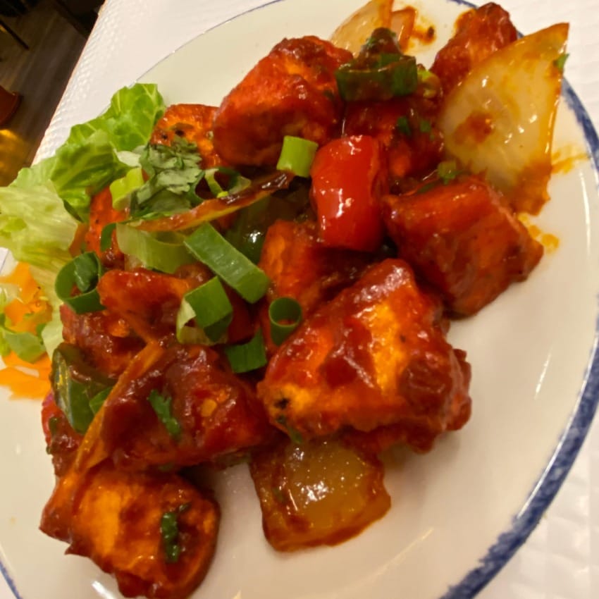 Chunks of spicy chilli paneer