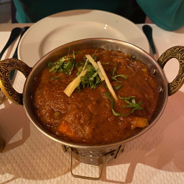 Spicy chicken curry in a deep tomato sauce