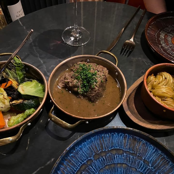 A hulking piece of beef cheek in gravy