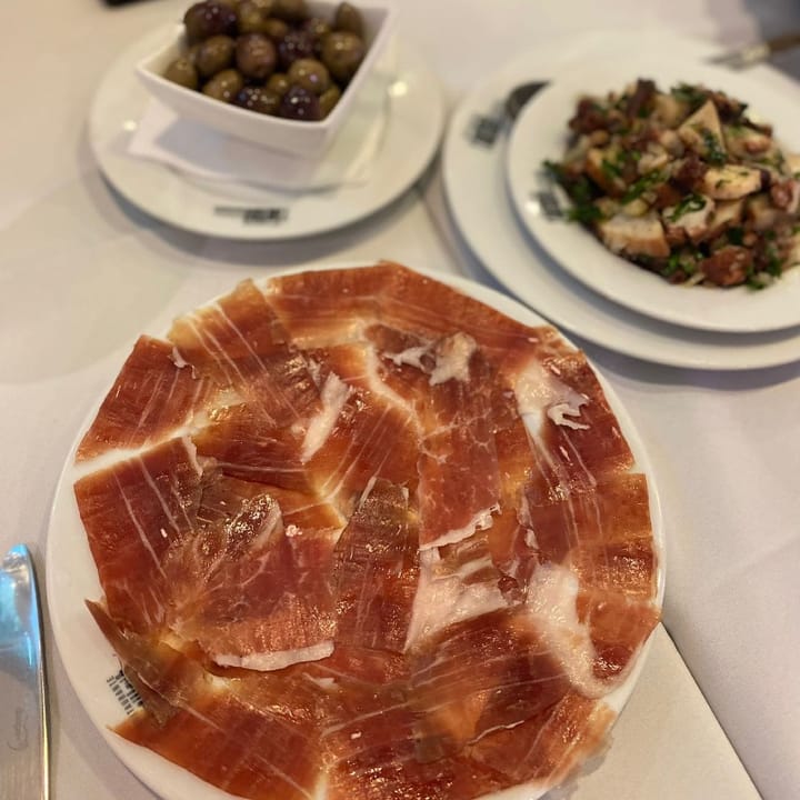 Rich and silky presunto ham, octopus salad and Portuguese olives