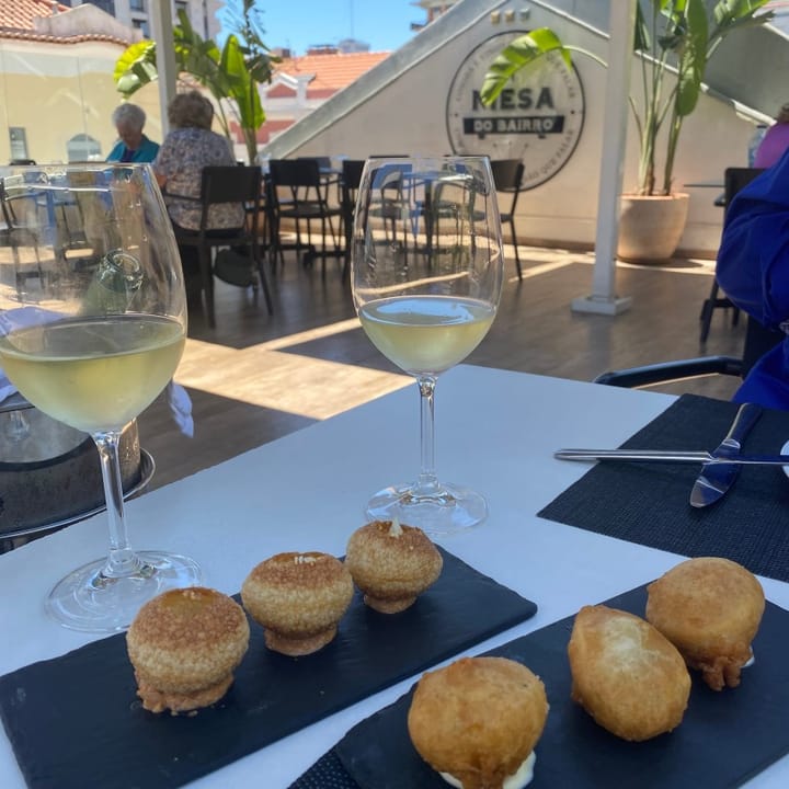 Deep-fried eggs and crab croquette starters served on a stunning rooftop terrace