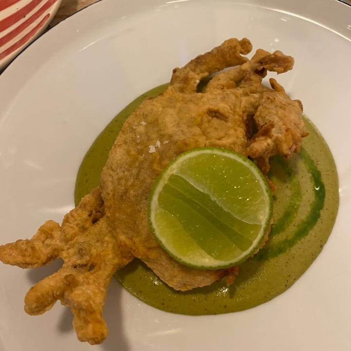 Deep-fried soft shell crab served on a mint and basil sauce.