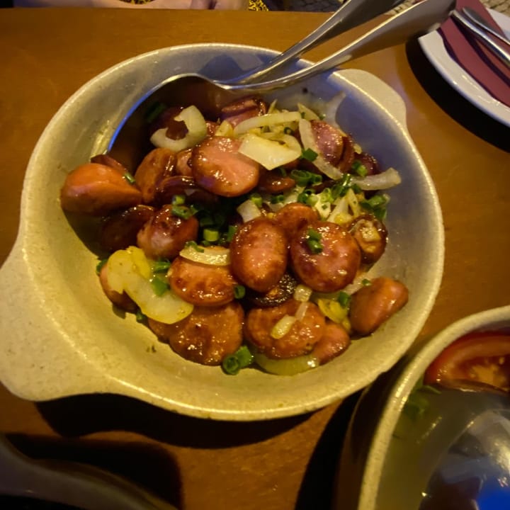 Spicy Italian sausage, grilled and fried with onion and scallions