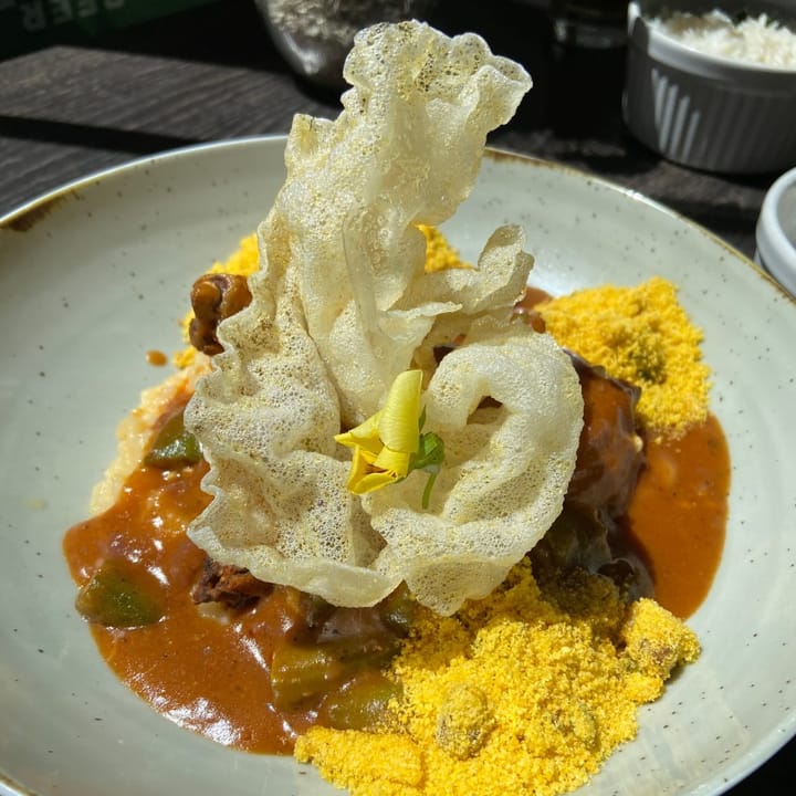 Grilled chicken with okra, polenta, gravy and crackling