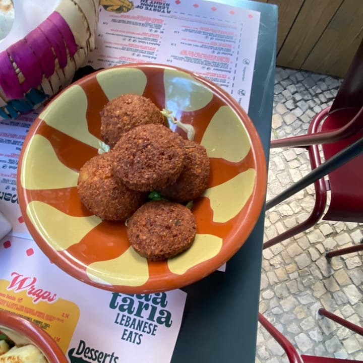 Bowl of five golden, crispy falafel balls, perfectly deep-fried
