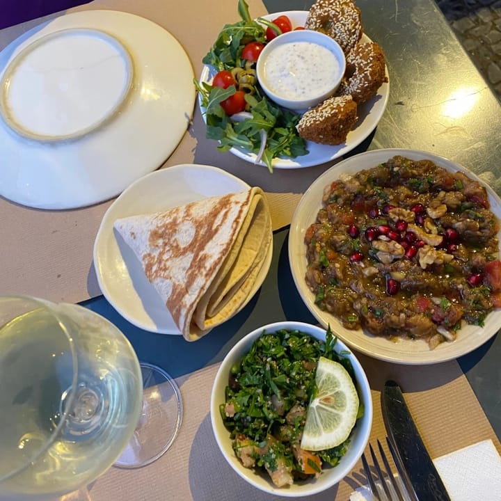 Falafel, babaganoush, tomato salad and flatbreads to dip
